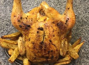 Una foto de Pollo al horno marinado con papas