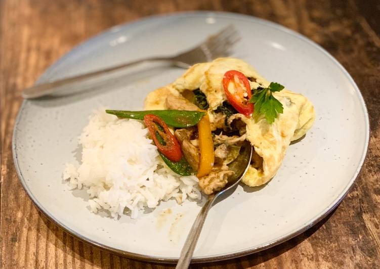 Delicious Chicken green curry stir-fry wrapped in omelette