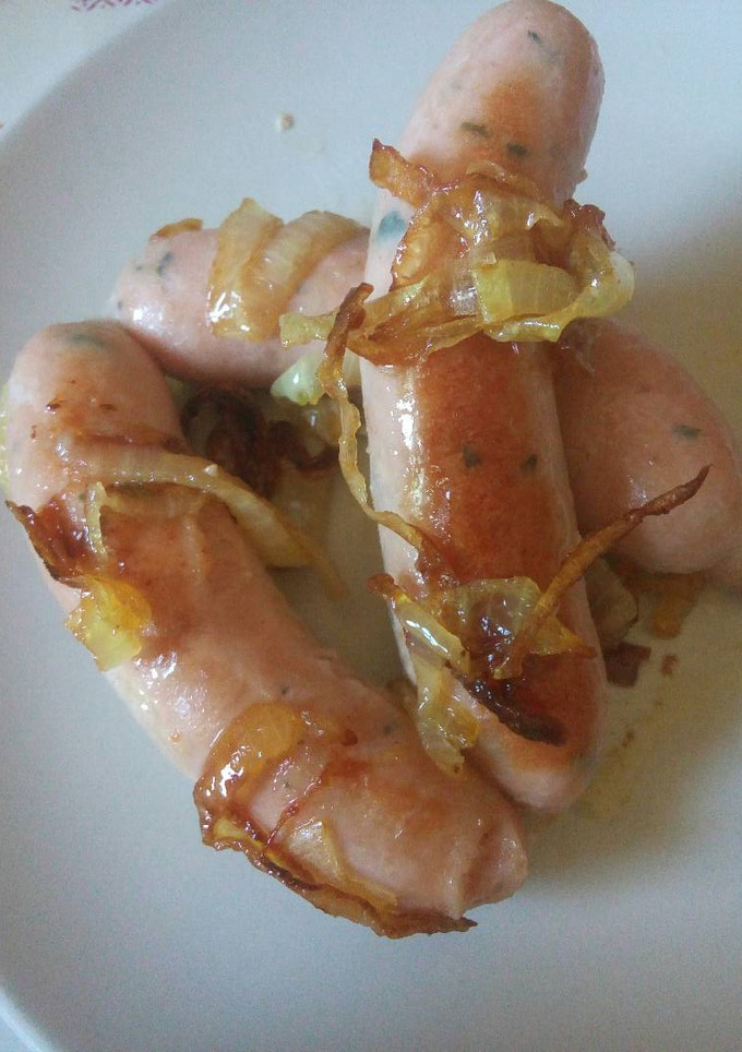 Una foto de Salchichas encebolladas