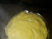 Una foto de polenta con queso