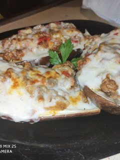 Una foto de Berenjenas rellenas y bechamel