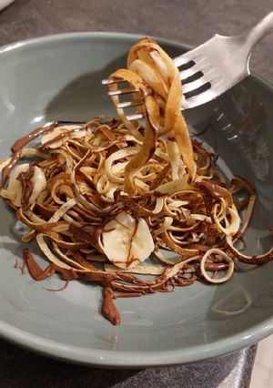 Une photo de Spaghetti de crêpes banane 🍌 Nutella