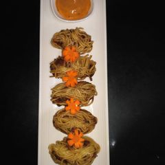 A picture of Spiral roll with cheesy veg.