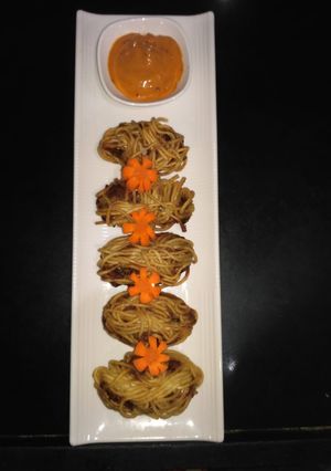 A picture of Spiral roll with cheesy veg.