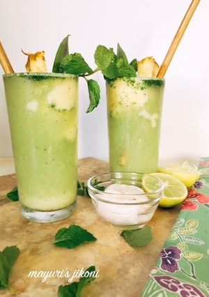 A picture of Pineapple Coconut Virgin Mojito Float #Seasonal Ingredients.