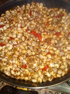 Una foto de Caracoles en salsa