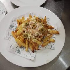 A picture of Cheesy fries.