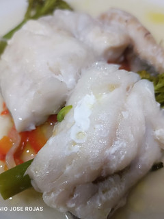 Una foto de Merluza en papillote