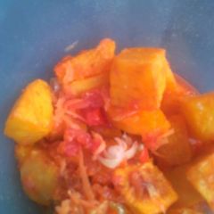 A picture of Mashed African Bajia with fresh kachumbari.
