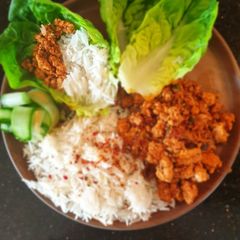 A picture of Chilli chicken lettuce cups.