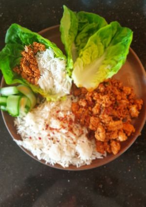 A picture of Chilli chicken lettuce cups.