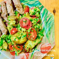 A picture of Potato salad with lemon zest and herbs.