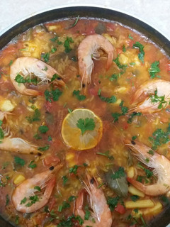 Una foto de Paella