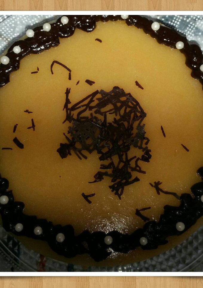 Una foto de Mousse de queso y cobertura de mango