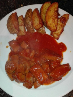 Una foto de Calamares en salsa americana con patatas Deluxe