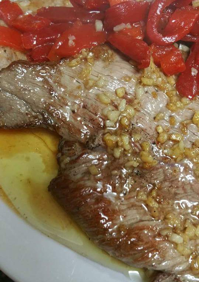 Una foto de Ternera asturiana al ajillo con pimientos
