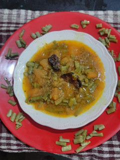 ગુવાર - ચીભડાં (કચ્છી) શાક (Guvar Chibhda (Kutchhi) Shak Recipe In Gujarati) રેસીપી મુખ્ય ફોટો