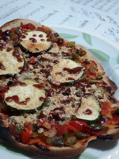 Una foto de Pizza vegana
