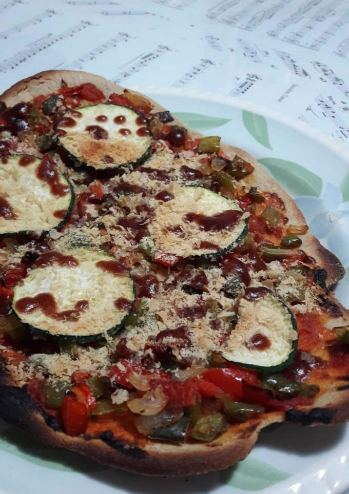 Una foto de Pizza vegana