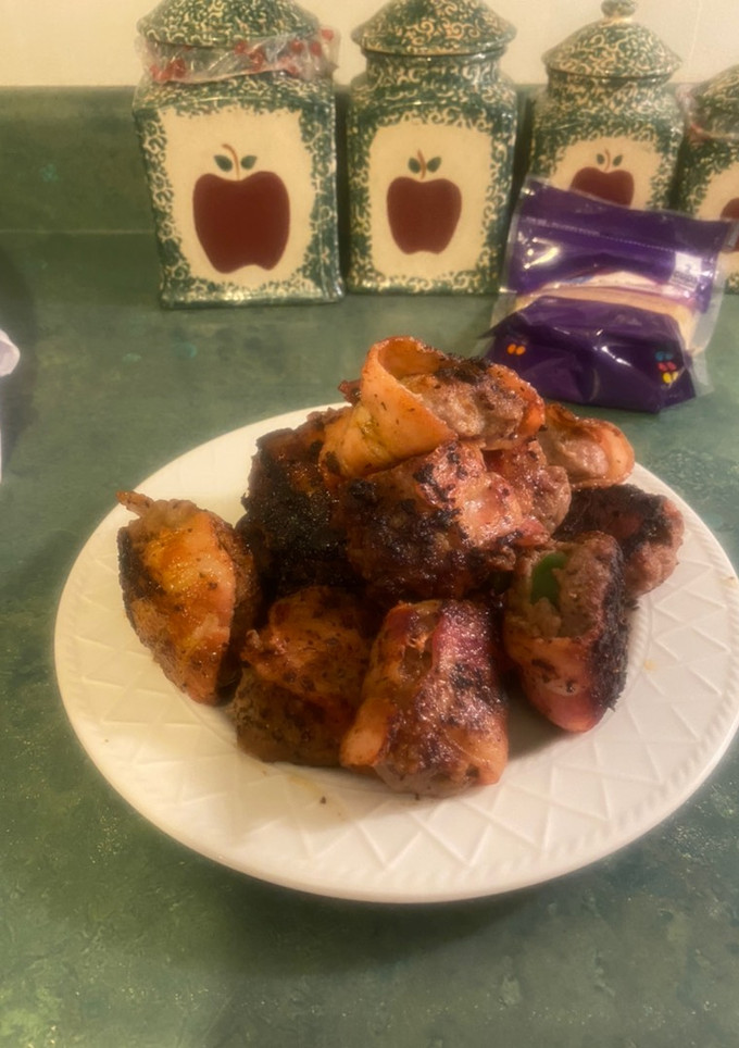 A picture of Bacon-wrapped jalapnos. 🔥 🙂.