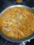 Paella de cigalas, gambones, colas de langostino y sepia