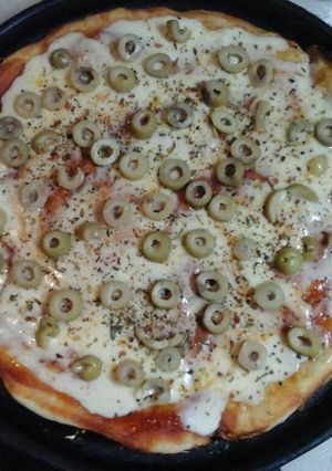Una foto de Pizza casera con harina leudante