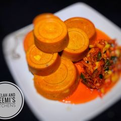 A picture of Moi - moi with cabbage sauce.
