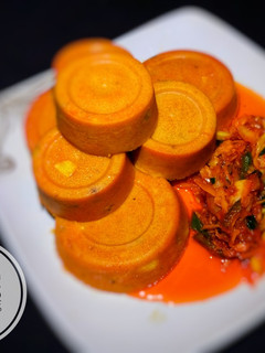 A picture of Moi - moi with cabbage sauce.