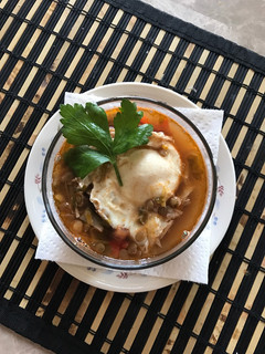 Una foto de Sopa de lentejas con huevo