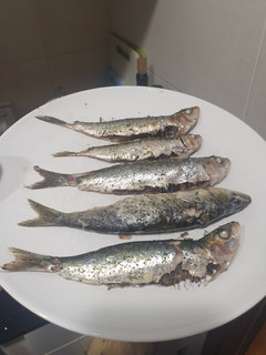Una foto de Sardinas al horno con ajo y perejil