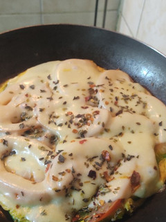 Una foto de Pizza de zapallito #saludable sin harina