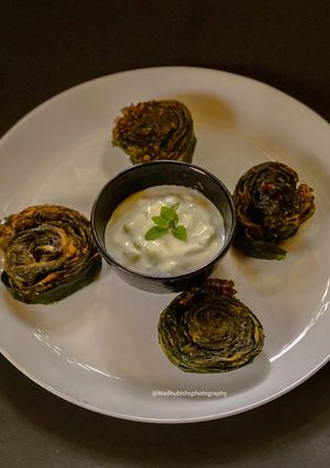 A picture of Arbi ki Patod & Tzatziki Dip.