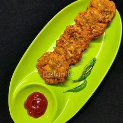 A picture of Banana Flowers and Masoor Dal Vada.
