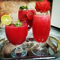 A picture of WaterMelon 3 ways🍉🍋🍀🍷(Slush,Juice and mojito).