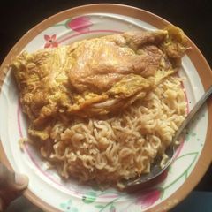 A picture of Indomie and fried egg.