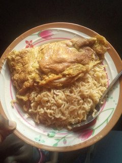 A picture of Indomie and fried egg.