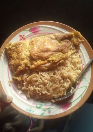 A picture of Indomie and fried egg.