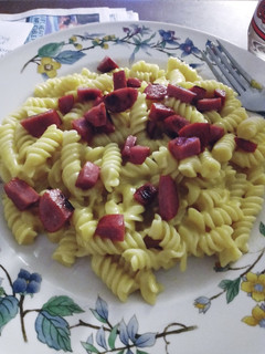 A picture of Velveeta Mac w/ Fried Smoked Sausage.