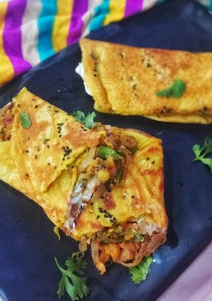 A picture of Besan Rolls with Shami Kabab filling.
