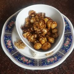 Caramelized walnuts with fox nut punjabi style A picture of Caramelized walnuts with fox nut punjabi style.
