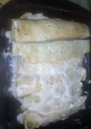 Una foto de Canelones de acelga y carne picada