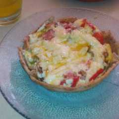 Foto principal de Mini tarta integral de roquefort y muzzarella con tomates cherry