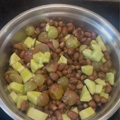 A picture of Cucumber Peanut Salad with Grapes.