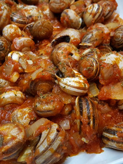 Una foto de Caracoles en salsa