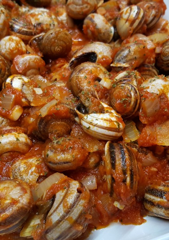 Una foto de Caracoles en salsa