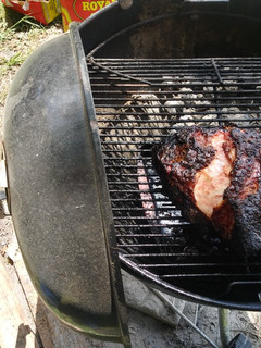 A picture of Smoked pork shoulder on the webber.