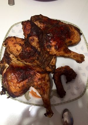 A picture of Oven-Baked Chicken in a Pan.