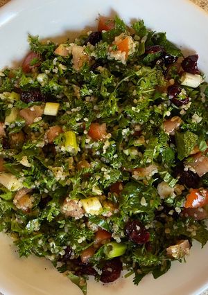 A picture of Tabbouleh with cranberries.