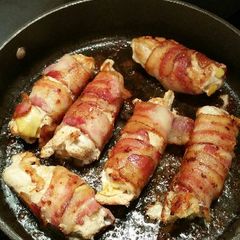 A picture of Bacon Wrapped Smoked Gouda Stuffed Chicken Breasts.