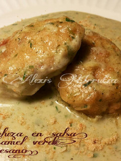 Una foto de Merluza en salsa bechamel verde, y parmesano